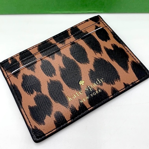 kate spade Handbags - Kate Spade Schuyler Small Slim
Card Holder
NWT SPOTTED ANIMAL COLOR